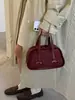 Bolso de mujer de nicho de lujo ligero, modelo nuevo 2026, bolso de hombro y cruzado vintage de alta gama, bolso de mano moderno y elegante