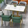 Cafetería minimalista y lujosa, restaurante occidental, asientos en cabina, sofá, tienda de postres y té de leche de moda, rincón de lectura informal, juego de mesa y sillas, cuero