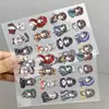 48 hojas de pegatinas de transferencia impermeables de avatares dibujados a mano con los personajes de dibujos animados del Grupo de Acción Súper Natural, incluyendo a Xiao Yao y Ling Li Li