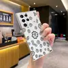 Funda de teléfono retro floral hueca de línea negra minimalista y elegante adecuada para Samsung S23, funda suave transparente