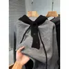 Suéter de Punto con Capucha y Cuello Semiabierto Bloque de Color para Hombre, Estilo Old Money, Suéter de Alta Gama Otoño e Invierno, Tendencia, Venta al por Mayor de Fábrica Transfronteriza
