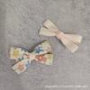 Horquillas para el pelo de estilo coreano para niñas, con lazo pequeño, diseño floral en beige y blanco, con clip lateral