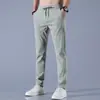 Ropa de Hombre Transfronteriza Verano 2026 Pantalones de Seda Hielo para Hombre Pantalones Finos Casual de Negocios Elásticos Transpirables de Pierna Recta Pantalones Deportivos