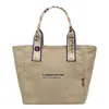 Bolsa de Lona Simple Estilo Coreano para Mujer 2026 Nueva Moda Casual Bolso para Ropa de Trabajo Gran Capacidad Bolso de Hombro de Clase