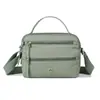 Bolsa de tela de nailon para mujer 2026 nuevo modelo transfronterizo bolsa pequeña ligera de color sólido bolso de mano casual para dama hombro cruzada bolsa para mamá