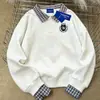 Sudadera Minimalista de Bloques de Color a Cuadros Patchwork con Cuello Polo para Mujer Invierno 2025 Versátil Adelgazante Estilo Coreano Top de Nicho