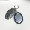 Nuevo Espejo Ovalado Espejo Multifuncional Peine Llavero Moda Versátil Colgante para Bolso/Llave Herramienta de Maquillaje Portátil