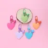 Nuevo llavero Bell love colgante lindo color resina corazón de durazno accesorios pequeño fresco adornos de corazón de durazno