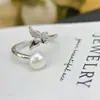 Set Sencillo de Aretes, Anillo y Collar con Lazo y Circonita de Mia para Mujer con Diseño de Lirio del Valle, Cadena para Clavícula, Lujo Ligero