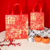 Bolsa de Regalo de Año Nuevo 2025 Bolsa del Día de Año Nuevo Tela No Tejida Roja Temática de Serpiente Bolsa Tote para Regalo