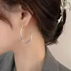 Pendientes de gota de agua de metal de 14 quilates de latón transfronterizo europeo y americano, con nicho de aguja de plata 925, joyería de alta calidad para mujeres.