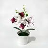 Orquídea artificial de alta gama, minimalista, en maceta, con cuatro flores en una maceta poco profunda, adecuada para la sala de estar, el recibidor o la decoración de escritorio.