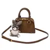 Bolsa Baguete Casual Portátil de Nicho Coreana para Mulheres Outono 2025 Novo Estilo Estilo Estrangeiro Luxo Acessível Versátil Bolsa de Ombro Único Transversal
