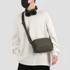 Nueva bolsa de hombro de viaje para hombres y mujeres, bolsa cruzada para caminar, bolsa de pecho texturizada, ligera, resistente al agua, bolsa cuadrada pequeña casual, al por mayor