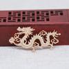Yiwu color rayo dorado cobre chapado en oro DIY forma de dragón dos dragones jugando con cuentas un par de accesorios para tocado antiguo de flor B2986