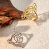 Venta caliente chapado en oro de 18 quilates sin decoloración presión de aceite temperamento elegante acero inoxidable de alta calidad línea retorcida anillo abierto