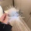 Pinza para el pelo de estrella de plumas negras súper de hada para mujer, flequillo lateral, alto sentido, celebridad de Internet, pinza de clip todo en uno, tocado, accesorios para el cabello