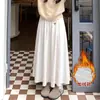 Saia de Renda com Arroz Pegajoso Feminina Outono Inverno 26 Nova Retrô Preguiçosa Cintura Alta Emagrecedora Linha A Comprimento Médio Versátil Bordada Meia Saia
