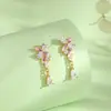 Pendientes de Plata de Ley s925 Flor de Glicinia Romántica para Niñas Esmalte Fluorescente Pendiente Colgante Diseño de Nicho Sentido del Temperamento Pendiente Suave