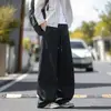 Pantalones cargo de paracaidista de estilo americano con costura dividida para hombre, otoño 2026, cintura elástica con cordón, corte recto de pierna ancha, pantalones casuales hasta el suelo