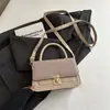 Bolso pequeño cuadrado tejido 2026 nuevo bolso de hombro de moda bolso simple para mujer bolso de mano pequeño bolso de mujer de comercio exterior bolso cruzado