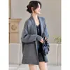 Cardigan de punto casual estilo minimalista coreano 2026 nuevo otoño bolsillo holgado moda versátil chaqueta suéter para mujer