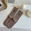 2026 Meias Novas Estilo Feminino Algodão Penteado Meias de Cano Médio Bordado de Coração Absorventes Dedos Sem Costura Quatro Estações Versátil Zhuji