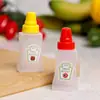Fronteiriça especial fábrica direta molheira pequena fofa squeeze molheira garrafa de tempero salada molho de tomate sub-garrafa lote