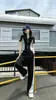 Conjunto Esportivo Casual para Mulheres, Estilo Fino de Verão, Roupas Femininas Modernas e Elegantes, Conjunto de Duas Peças com Blusa de Manga Curta Color Block Emagrecedora e Calça Wide Leg