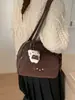Design Coreano de Cor Pura Simples e Fashionável Roupa de Trabalho 2025 Outono e Inverno Pingente Nova Bolsa Transversal Boston para Mulheres