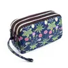 Venta al por mayor de fábrica nueva cartera monedero bolso femenino coreano estampado cartera bolso para teléfono móvil cartera de dama bolso de tela para correr