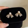 Elegante HerederaEstilo Fresco Bolso de Lunares Plateados Arete Arete Único Mujer 2026 Aretes Súper Hermosos