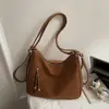 Bolsa de Ombro Nova Estilo Primavera 2026 Retrô Fashionável e Elegante de Aparência Sofisticada para Trabalhadores de Escritório no Trajeto Bolsa Tote Retrô