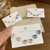 Joyería de Diamantes con Flor de Ciruelo Brillante de Nuevo Estilo, Diseño Geométrico Irregular Simple, Sensación de Lujo Ligero y Gama Alta, Múltiples Estilos de Aretes