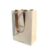 Bolsa de Cartón Blanco de Alta Gama con Logo Personalizado Bolso de Papel para Joyería con Tienda de Ropa Personalizada Bolsa de Regalo para Compras