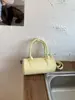 Bolsa de Mão Prata para Mulheres, Novo Modelo Primavera 2026, Bolsa de Ombro Trendy de Nicho, Textura de Alta Qualidade, Elegante Transversal e de Mão