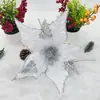 Suministrados directamente por el fabricante, cabezas de flores artificiales para decoraciones de Navidad, Festival de Primavera y bodas están disponibles para venta al por mayor, ofreciendo una sensación de alta gama con flores artificiales individuales