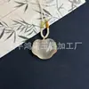 Nuevo colgante de cerradura Ruyi de piedra ojo de gato al por mayor, nuevo accesorio de cerradura Ruyi estilo chino, cadena para la clavícula de vidrio de diseño nicho