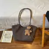 Otoño 2026 Nuevo Bolso de Hombro Liso de Gran Capacidad para Viajes Diarios Bolso de Textura Tejida Bolso Tote de Moda de Alto Valor para Mujer