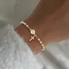 Pulsera Cruz de Perlas de Agua Dulce de 26 Letras Transfronteriza Europea y Americana Joyería de Moda para Combinar Regalo de Aniversario