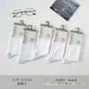Série Xin Shiyu Outono e Inverno Novo Estilo Meia de Algodão Espessa All-In-One de Cano Médio, Meias Lisas de Ponto Duplo Perfumadas, Modernas e Versáteis