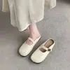 Primavera Verano 2026 Nuevo Moda de Comercio Exterior Mules Planos Cerrados Estilo Francés para Mujer Mules de Exterior Transfronterizos