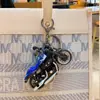 Llavero Creativo Mini Motocicleta Harley Dibujo Animado Aleación Coche de Tirar Hacia Atrás Modelo Colgante Pequeño Regalo Venta al por Mayor