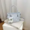 Bolsa de bolinhas de verão transfronteiriça super popular de nicho para mulheres 2026 nova moda versátil bolsa transversal bolsa de mão para o trabalho bolsa feminina
