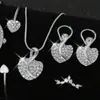 Moda Europea y Americana Colgante en Forma de Corazón Collar para Clavícula Pendientes Anillo Pulsera Juego de Joyería de Cuatro Piezas Corazón de Melocotón para Boda