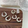 Corea del Sur Hebilla de Oreja Retorcida de Plata Esterlina Pendientes de Círculo Lujo Ligero Diseño de Nicho Pendientes de Círculo Elegantes Nuevos Explosivos 2025