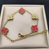 Comercio Exterior Venta Caliente Pulsera de Acero de Titanio con Incrustaciones de Diamantes Trébol de Cuatro Hojas Doble Cara Lujo Ligero Sensación de Alta Gama Joyería Popular de Nicho para Mujeres Fabricante