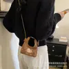 Otoño 2026 Nuevo Bolso de Hombro Bordado Corazón Dulce de Moda Dibujo Animado Lindo Bolso de Mano para Bebé Mini Bolso Infantil
