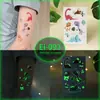 Pegatinas de Tatuaje de Dibujos Animados para Niños, Mundo de Dinosaurios Luminoso, Pegatinas Temporales Impermeables para Cara de Niños y Niñas, Stock Listo Transfronterizo