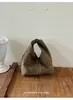 Bolso de mano texturizado y plisado con forma de nube para mujer, nuevo bolso de mano de gamuza estilo francés 2026, bolso tote pequeño, bolso tipo cubo, moderno